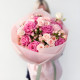 Букет из роз, гвоздик, ягод и эустомы
